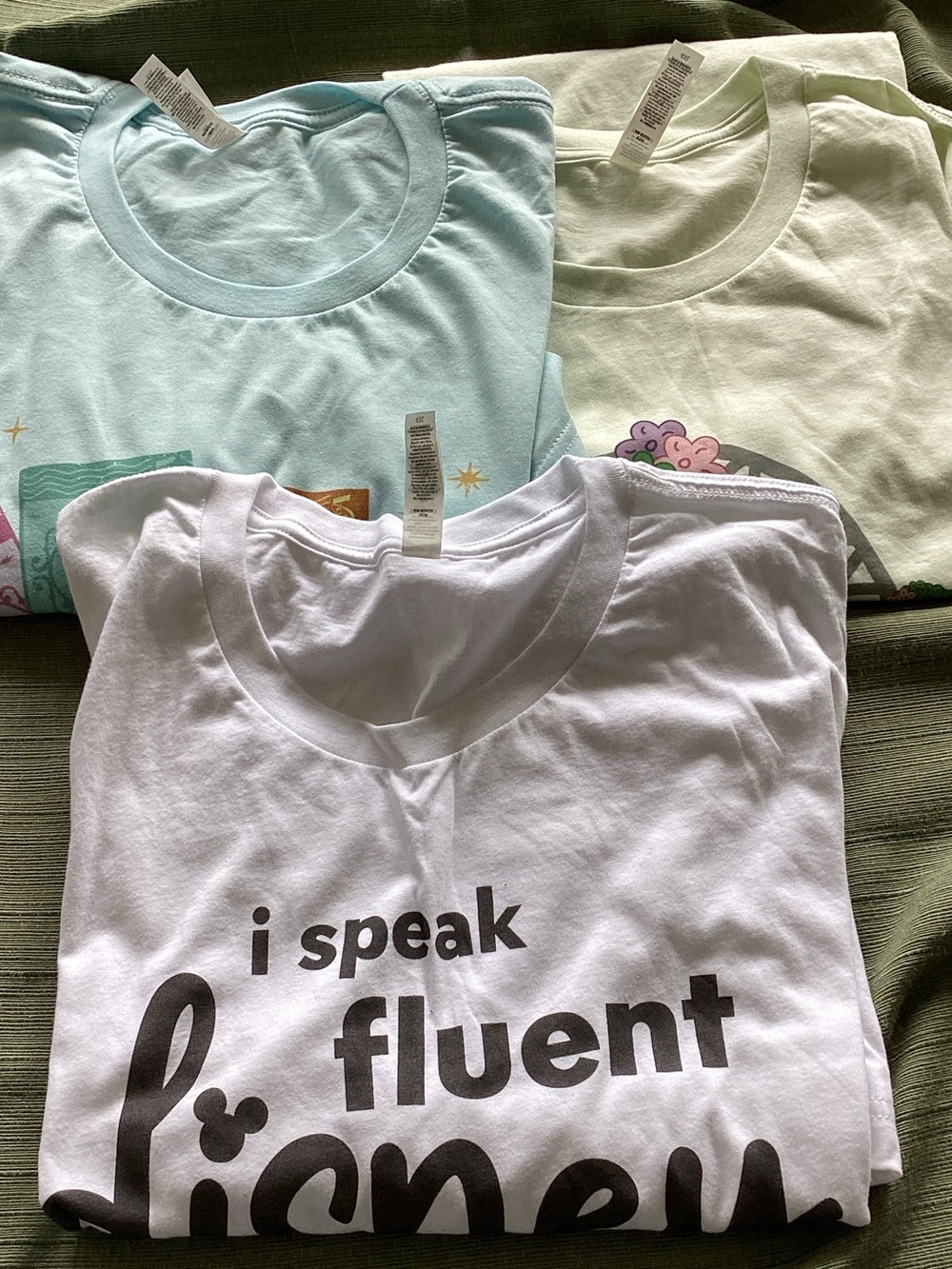 Bella Canvas White Graphic Tee with Pastel Mint and Light Blue Tops